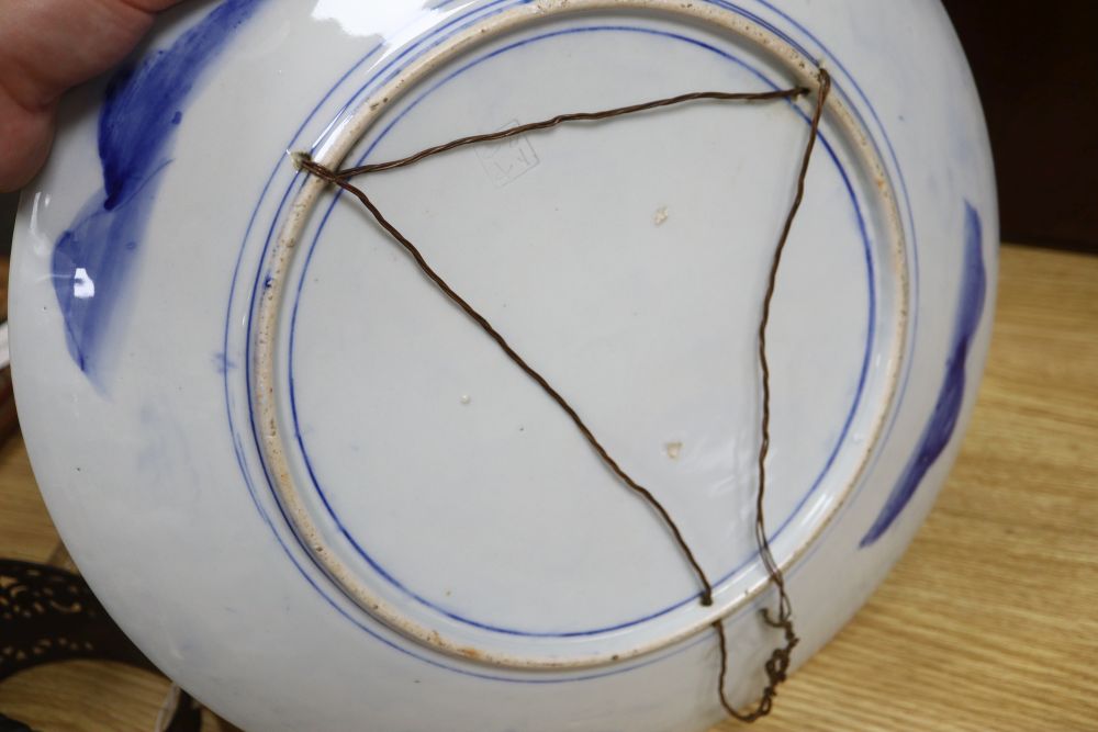 A pair of blue and white chargers